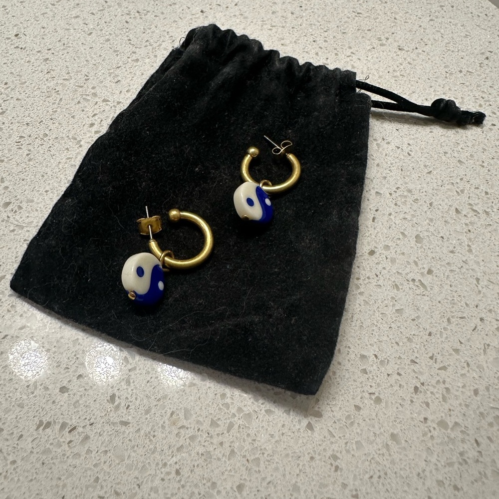 Madewell gold hoops with blue yin yang earrings